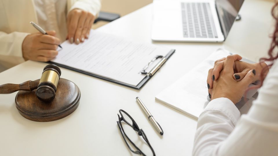 Lawyer and client reviewing legal document