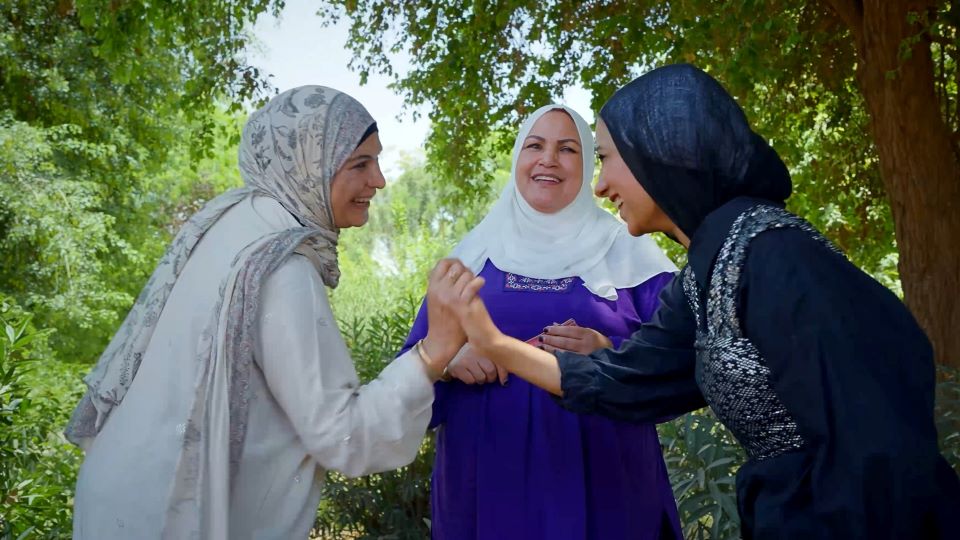 Women discussing and laughing in nature