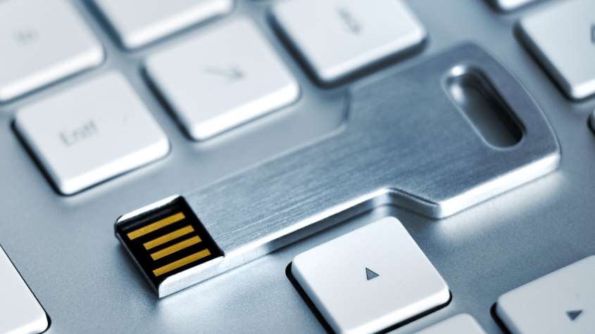 A memory card in the form of key symbolizing valuable business information protected by trade secret