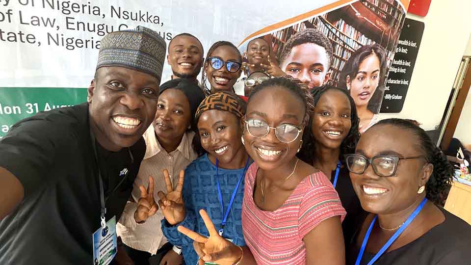 Smiling participants and a facilitator posing together for a selfie during the WIPO-Nigeria Summer School 2026, with some making peace signs
